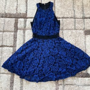 City Triangles Dress. Size 1. Blue Lace with a zip up back.
